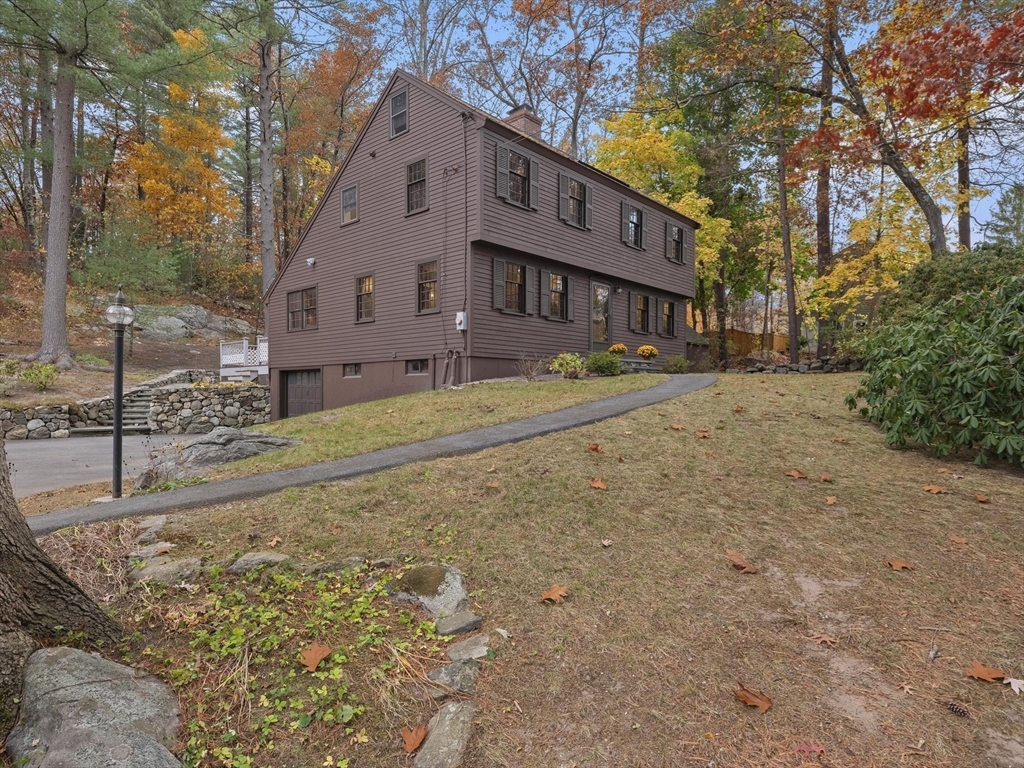 38 Mohawk Drive Acton, MA 01720 - Photo 3 of 35 a view of a large house with a yard
