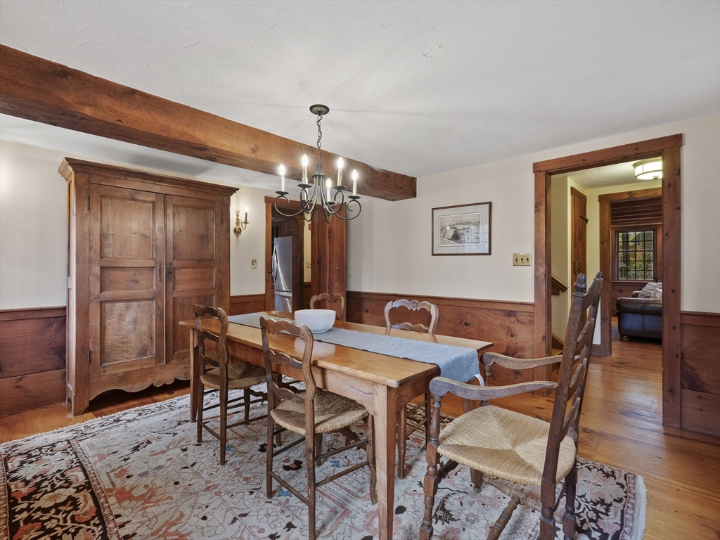 38 Mohawk Drive Acton, MA 01720 - Photo 8 of 35 a view of a dining room with furniture and wooden floor