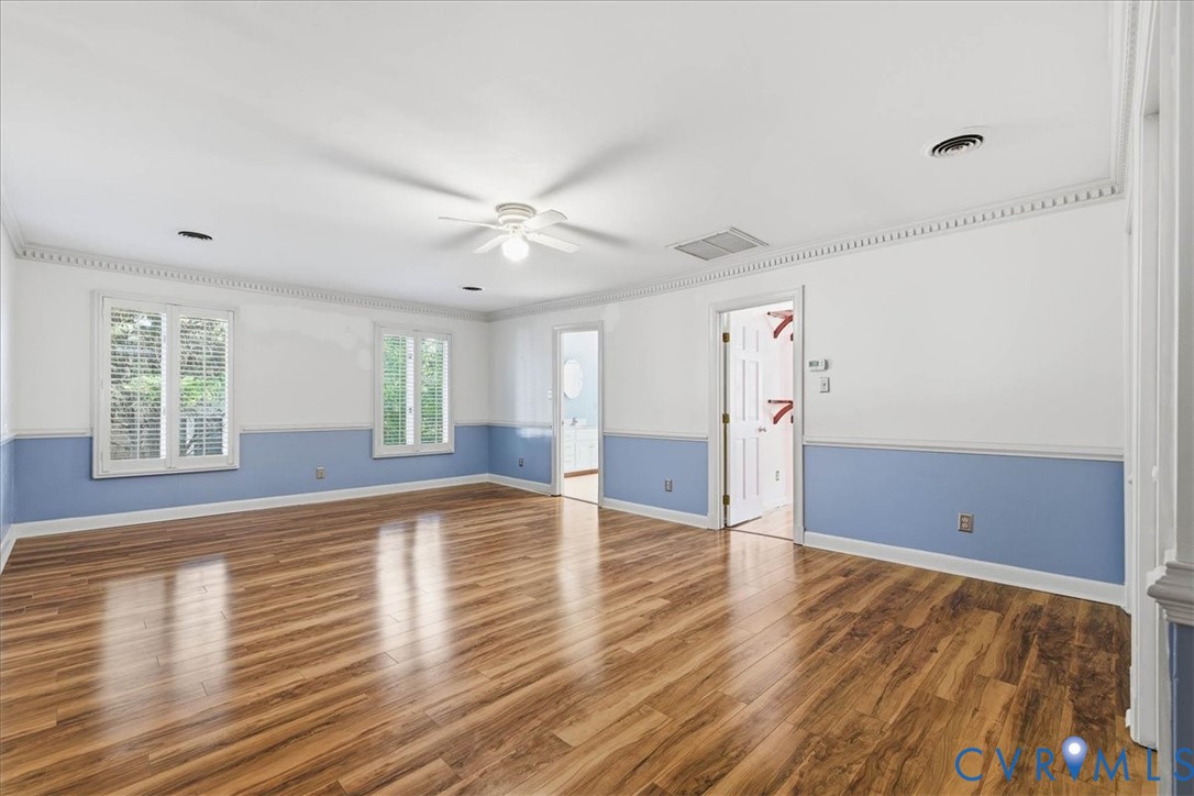 503 Prince George Avenue Hopewell, VA 23860 - Photo 15 of 25 wooden floor in an empty room with a window