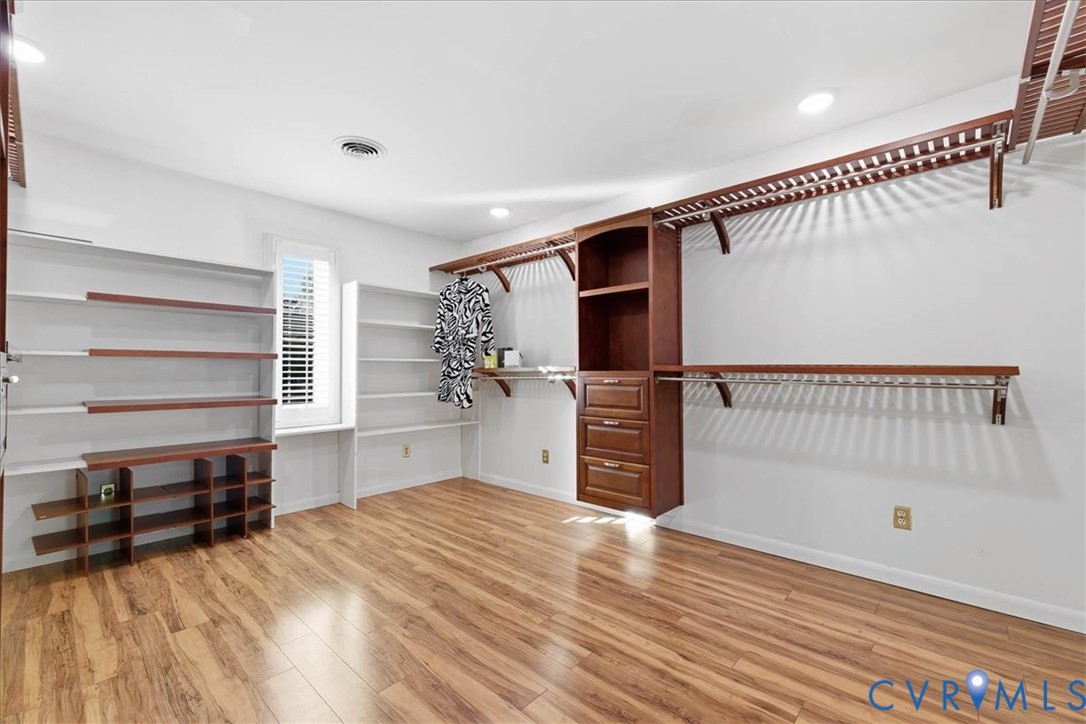 503 Prince George Avenue Hopewell, VA 23860 - Photo 16 of 25 a view of empty room with wooden floor and windows