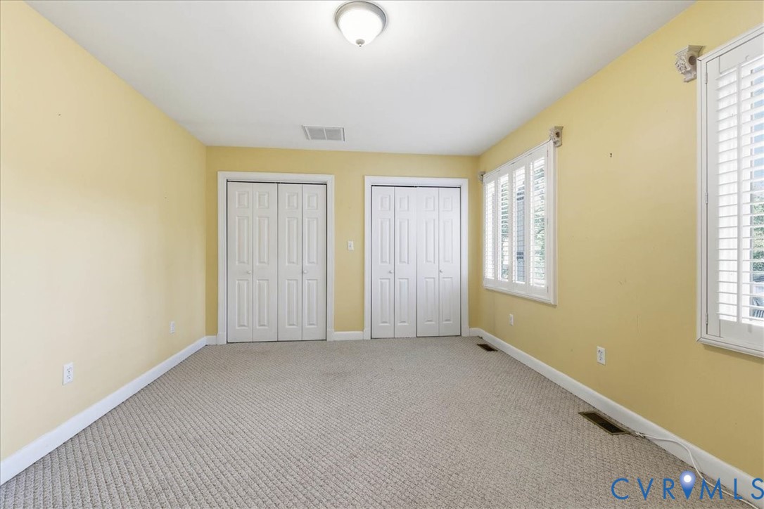 503 Prince George Avenue Hopewell, VA 23860 - Photo 20 of 25 a view of an empty room with a window