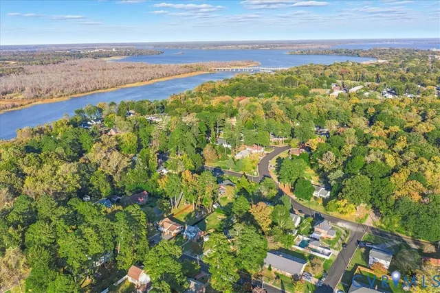 a view of a field with an ocean