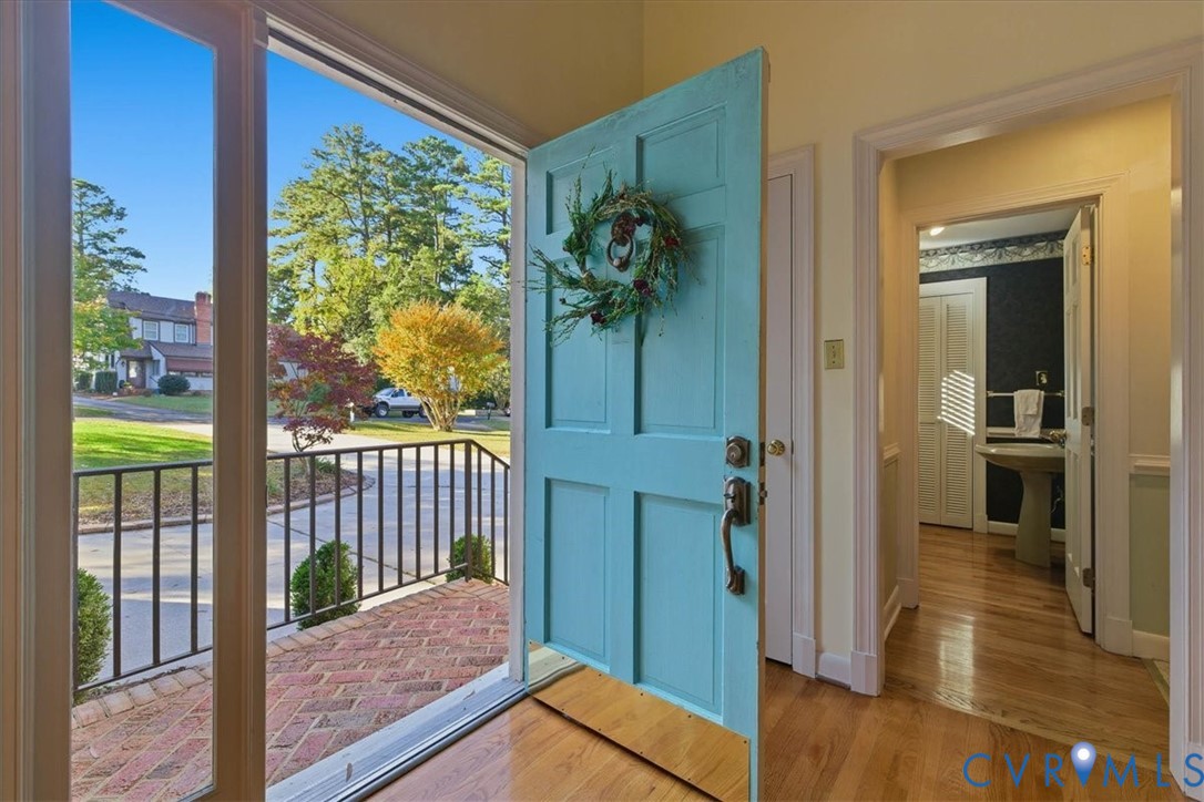 503 Prince George Avenue Hopewell, VA 23860 - Photo 4 of 25 a view of a hallway view with wooden floor and dining room