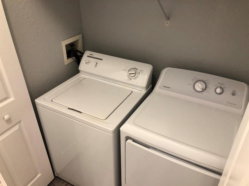 831 Camargo Way, Unit 302 Altamonte Springs, FL 32714 - Photo 13 of 28 a utility room with dryer and washer