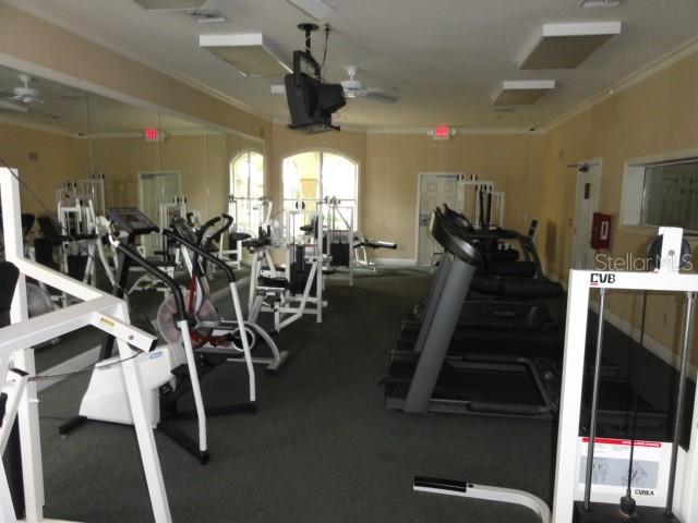 831 Camargo Way, Unit 302 Altamonte Springs, FL 32714 - Photo 21 of 28 a view of a room with gym equipment