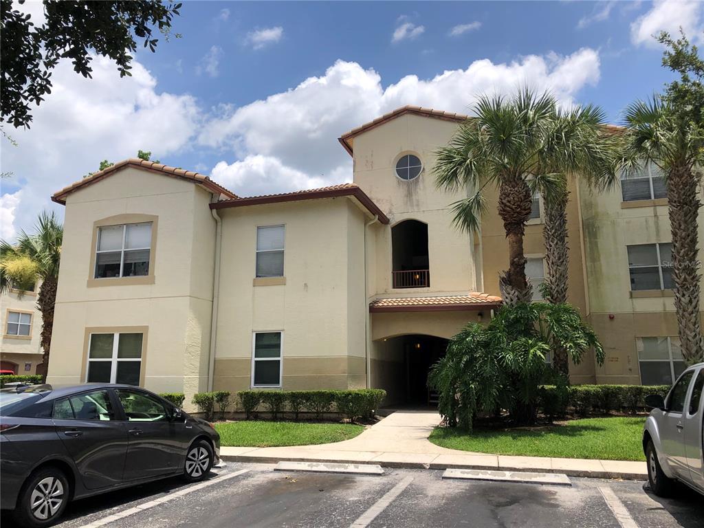 831 Camargo Way, Unit 302 Altamonte Springs, FL 32714 - Photo 25 of 28 a front view of a house with garden