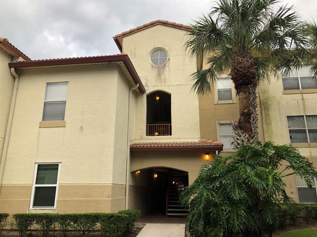 831 Camargo Way, Unit 302 Altamonte Springs, FL 32714 - Photo 26 of 28 a front view of a house with garden
