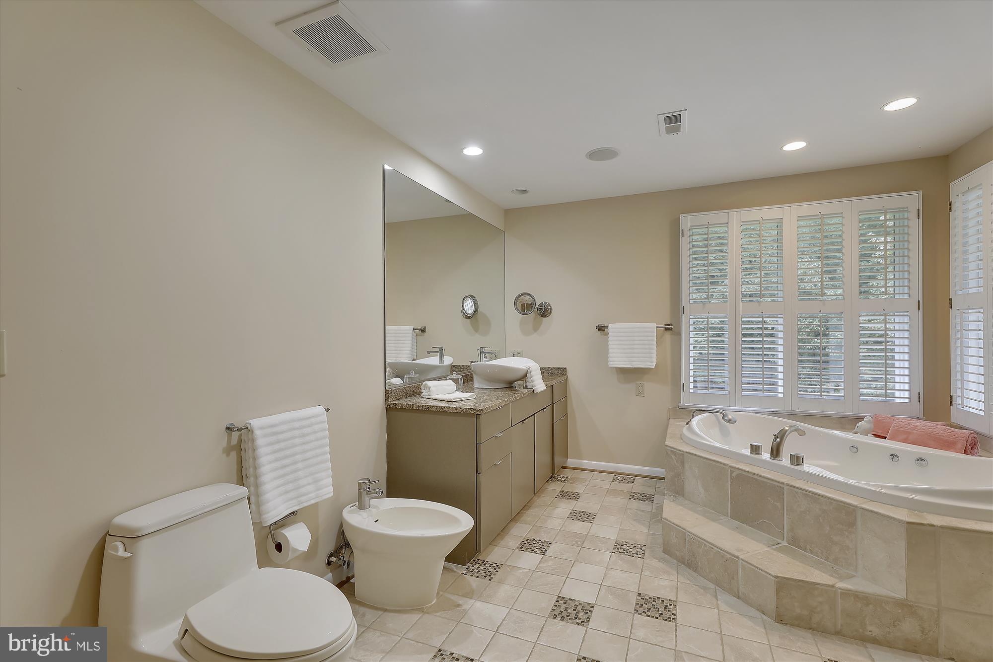 408 S Road Baltimore, MD 21208 - Photo 23 of 38 Master Bath 1 w/bidet, tub & shower