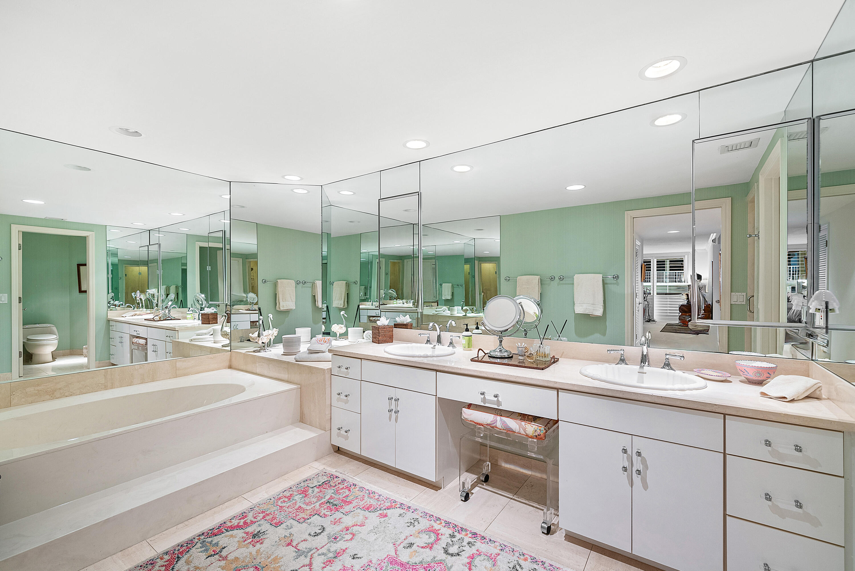 3140 South Ocean Boulevard, Unit 303S Palm Beach, FL 33480 - Photo 13 of 33 a large bathroom with a large mirror and sink