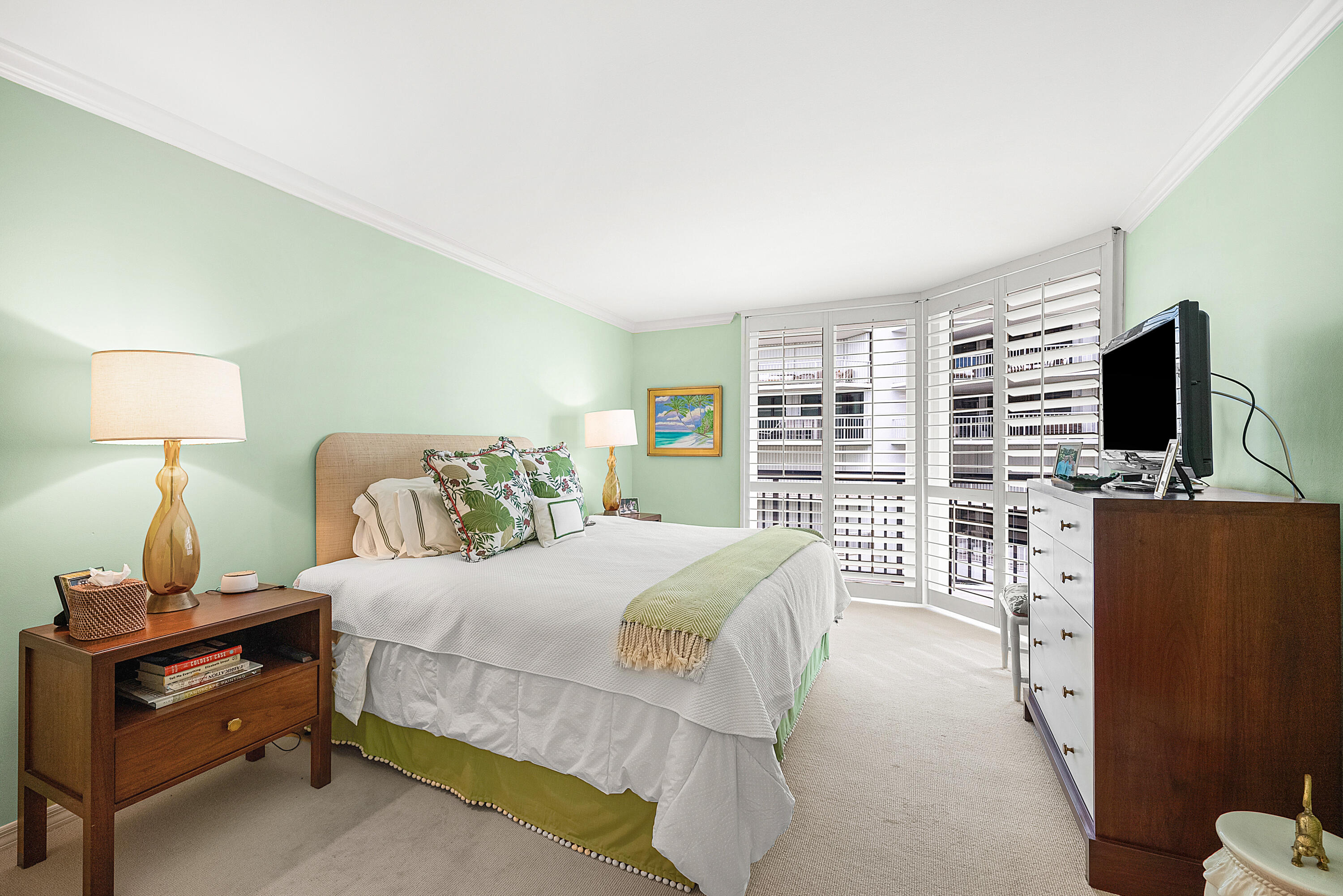 3140 South Ocean Boulevard, Unit 303S Palm Beach, FL 33480 - Photo 16 of 33 a bedroom with a bed furniture and a flat tv screen