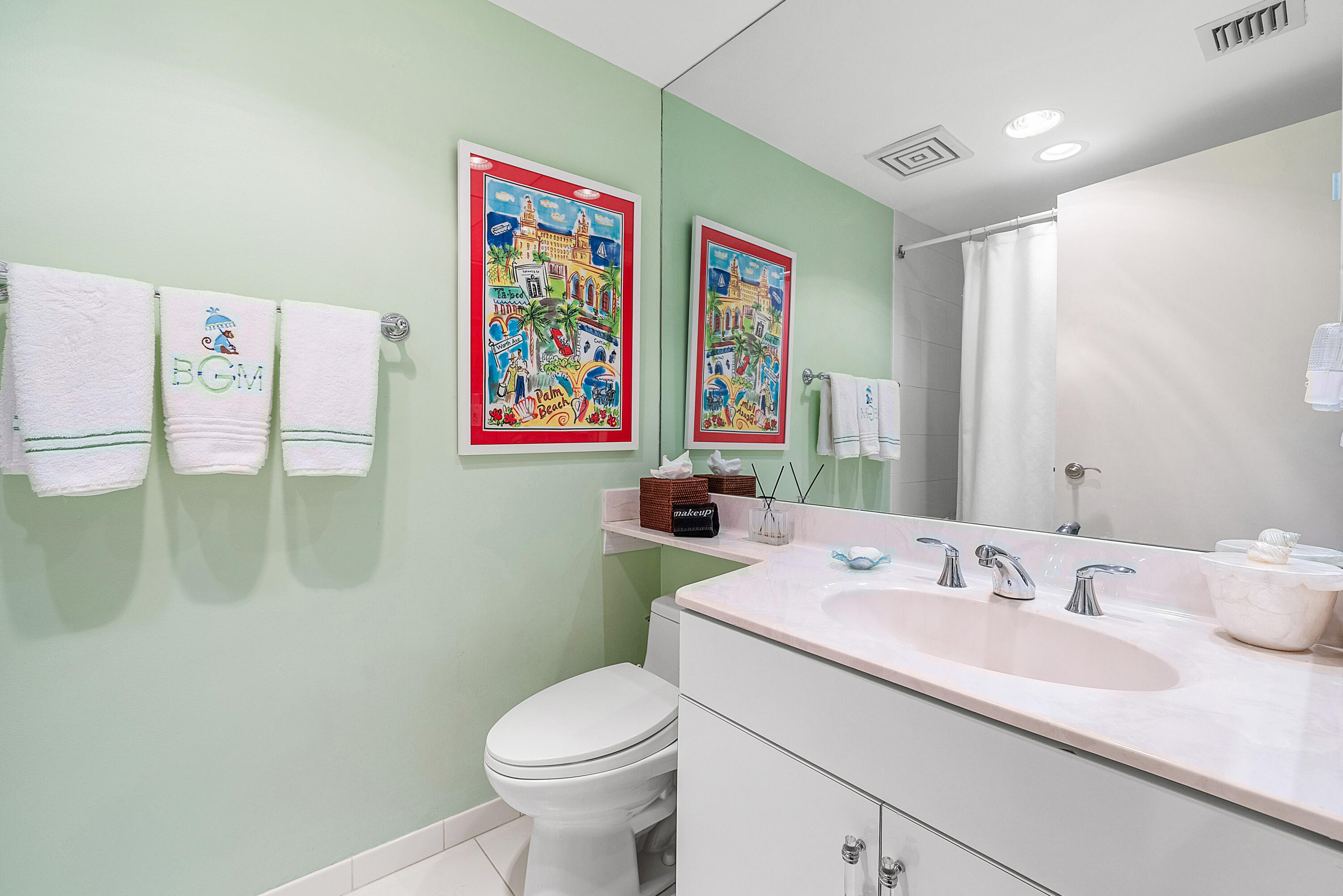 3140 South Ocean Boulevard, Unit 303S Palm Beach, FL 33480 - Photo 17 of 33 a bathroom with a sink mirror vanity and toilet