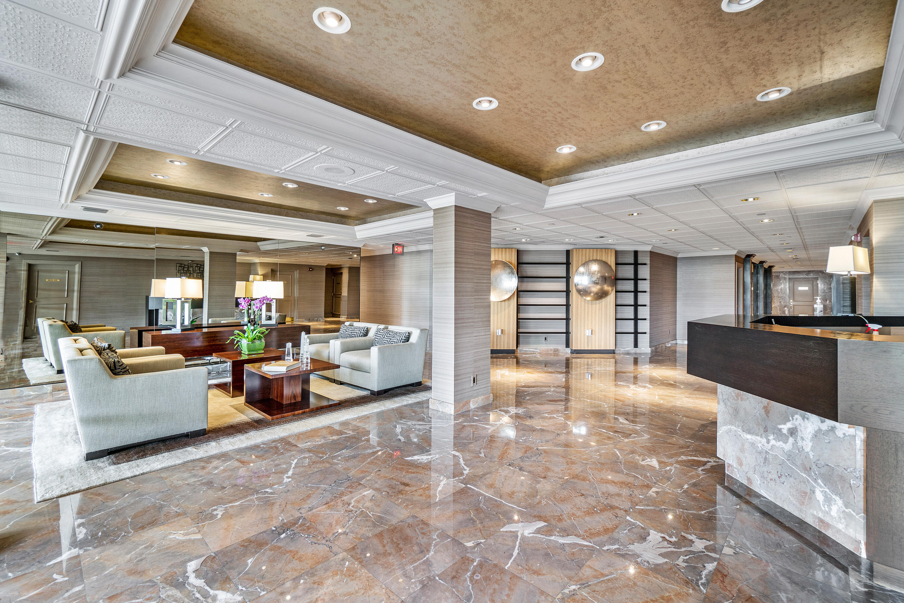 3140 South Ocean Boulevard, Unit 303S Palm Beach, FL 33480 - Photo 27 of 33 a lobby with furniture and a kitchen