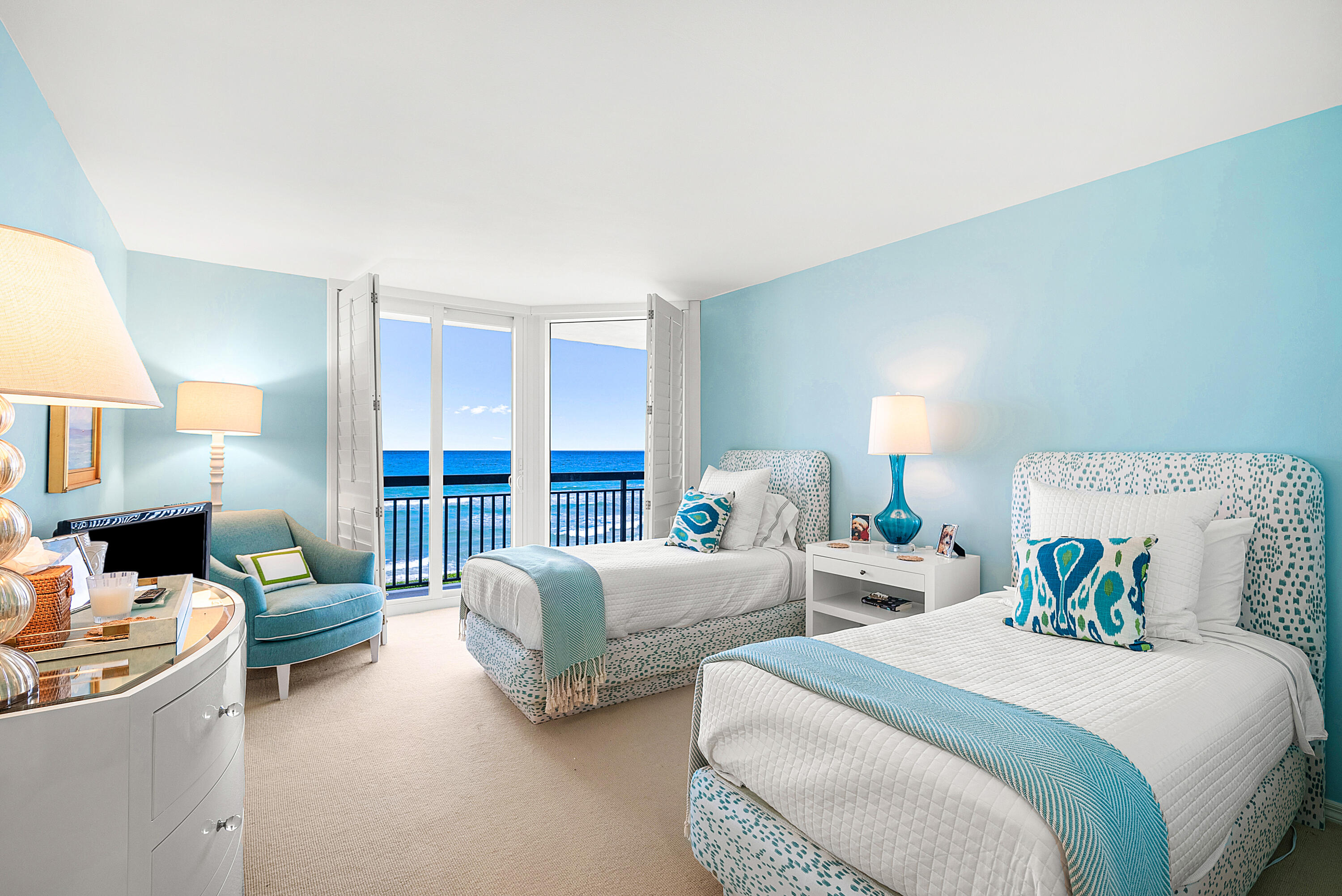 3140 South Ocean Boulevard, Unit 303S Palm Beach, FL 33480 - Photo 8 of 33 a bed room with two beds and a fireplace