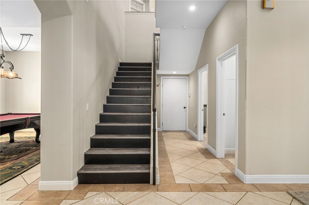 24806 Carlos Place Newhall, CA 91321 - Photo 15 of 56 a view of an entryway with wooden floor