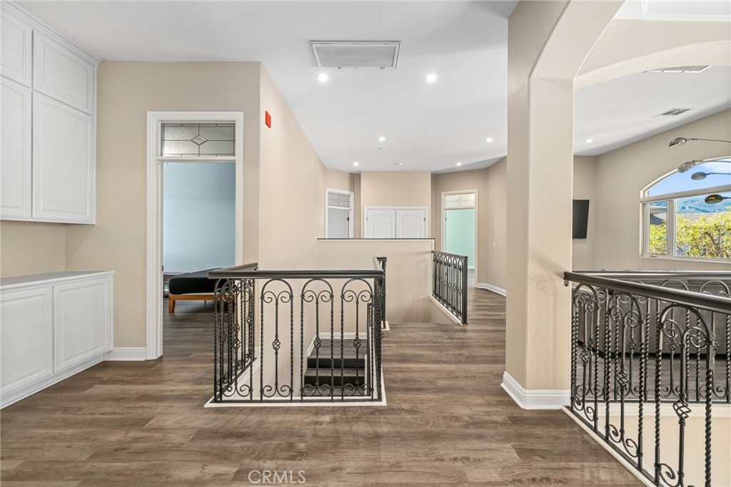 24806 Carlos Place Newhall, CA 91321 - Photo 16 of 56 a view of entryway with wooden floor