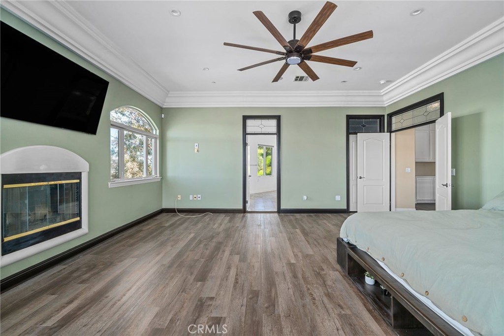 24806 Carlos Place Newhall, CA 91321 - Photo 19 of 56 a view of livingroom with hardwood floor and a ceiling fan