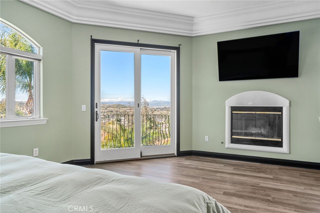 24806 Carlos Place Newhall, CA 91321 - Photo 20 of 56 a view of an empty room with glass door and windows