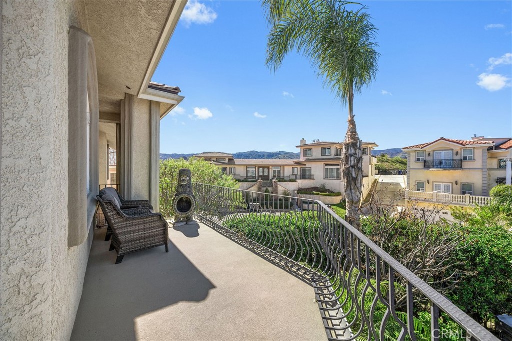 24806 Carlos Place Newhall, CA 91321 - Photo 21 of 56 a view of a balcony with chairs