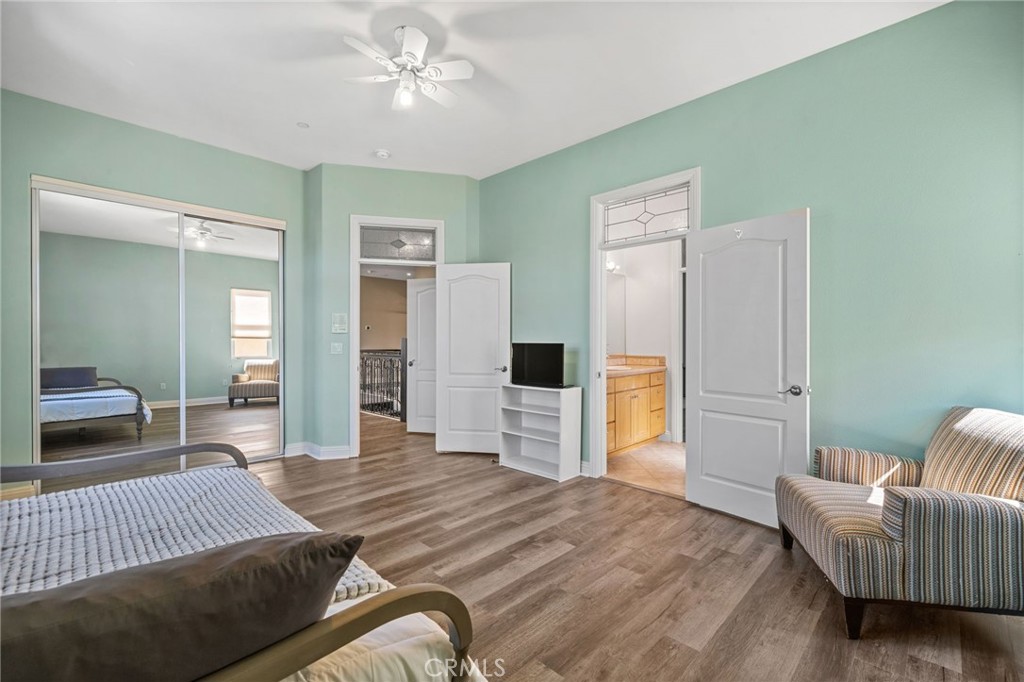 24806 Carlos Place Newhall, CA 91321 - Photo 31 of 56 a bedroom with a bed and a couch