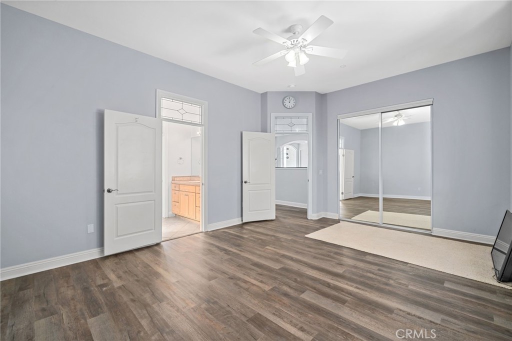 24806 Carlos Place Newhall, CA 91321 - Photo 34 of 56 wooden floor in an empty room with a window