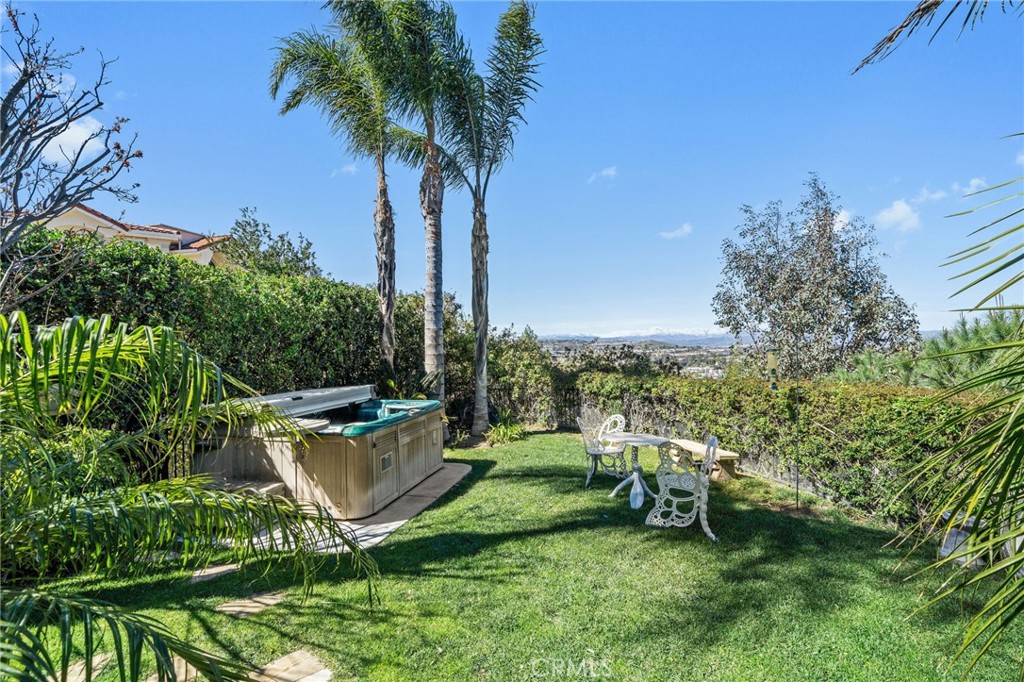 24806 Carlos Place Newhall, CA 91321 - Photo 45 of 56 a view of a chair and table in the garden