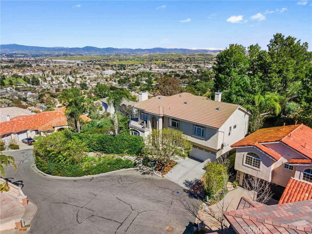 24806 Carlos Place Newhall, CA 91321 - Photo 49 of 56 an aerial view of a house with a garden