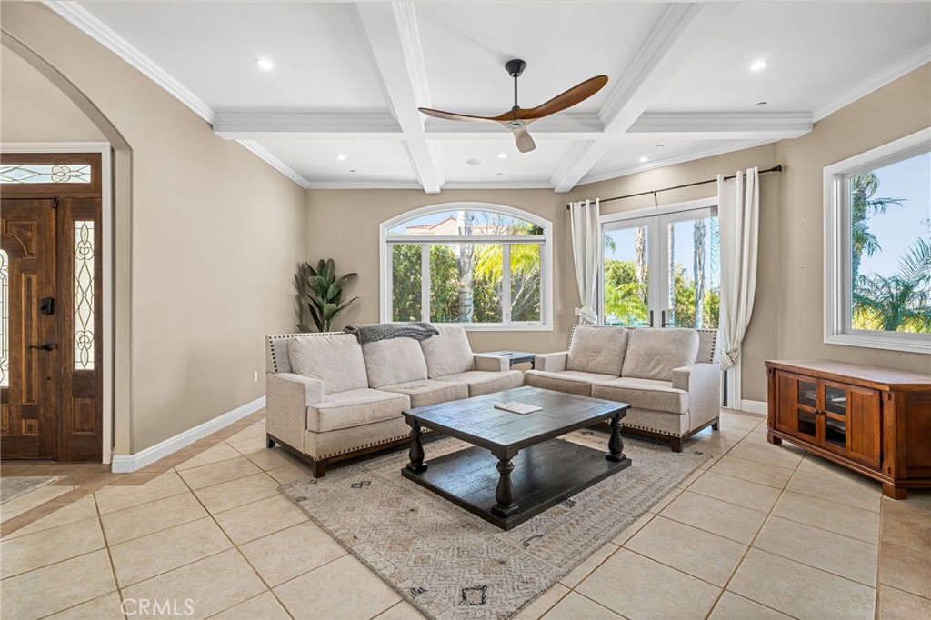 24806 Carlos Place Newhall, CA 91321 - Photo 6 of 56 a living room with furniture and a large window