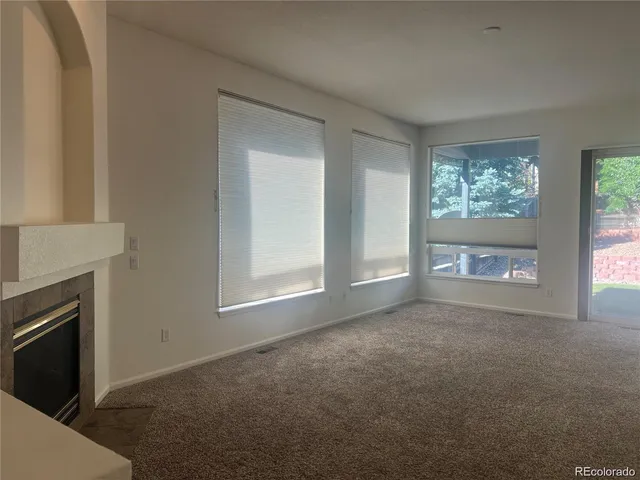 a view of empty room with front door
