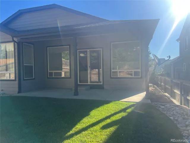 a view of backyard of a house