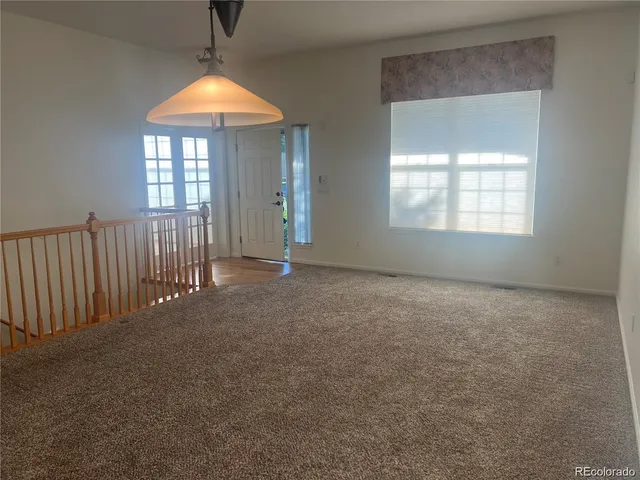 an empty room that has a window