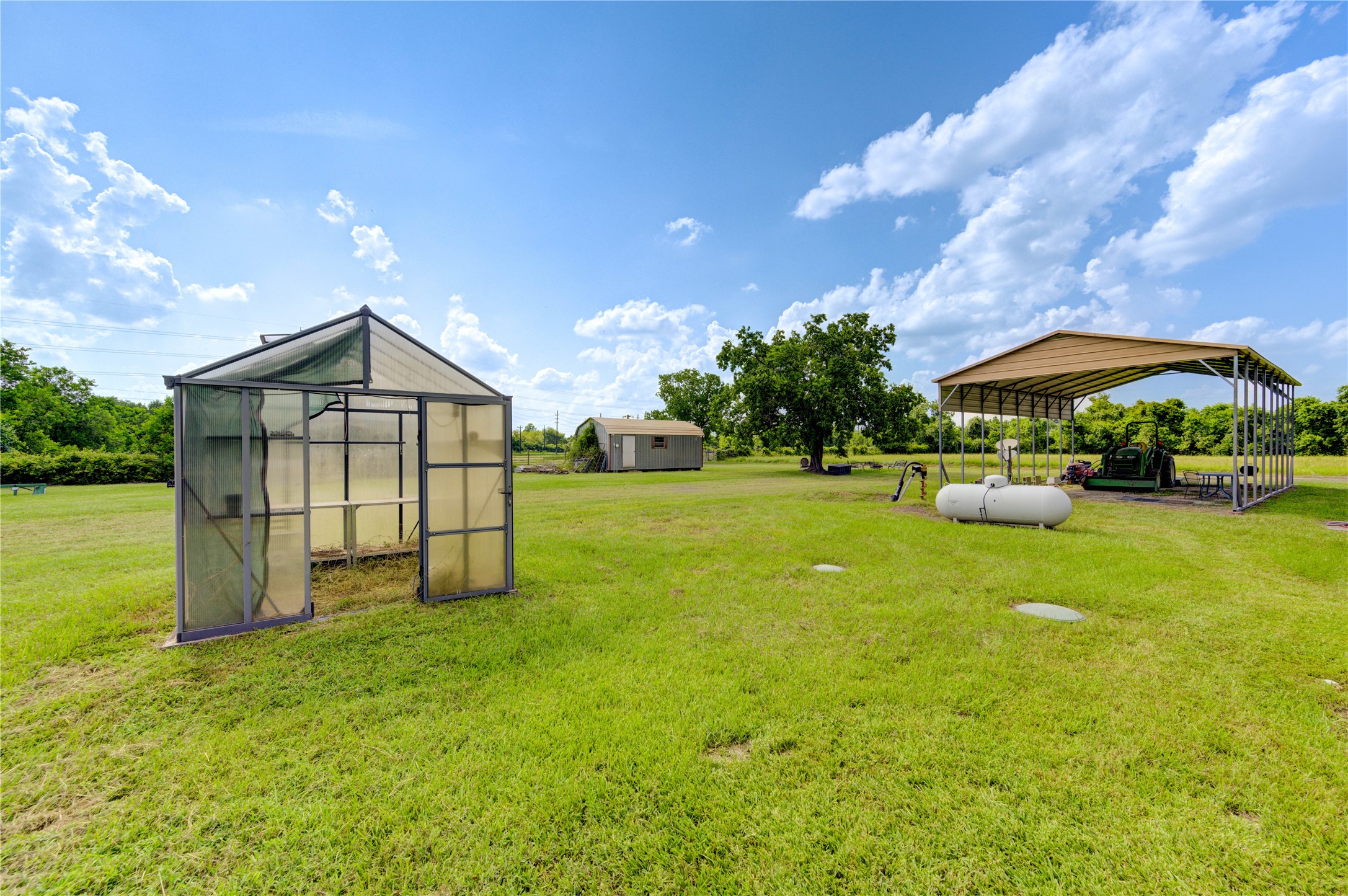 922 Agg Road Tomball, TX 77375 - Photo 9 of 23 a view of a house with a yard