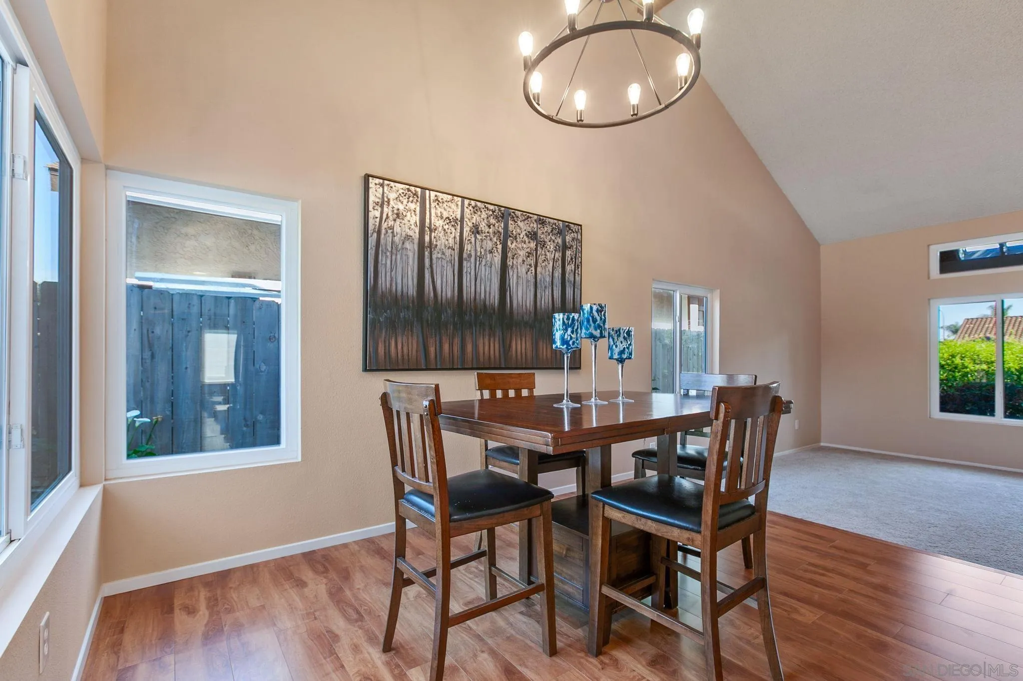 4468 Inverness Drive Oceanside, CA 92057 - Photo 11 of 29 a view of a dining room with furniture and wooden floor