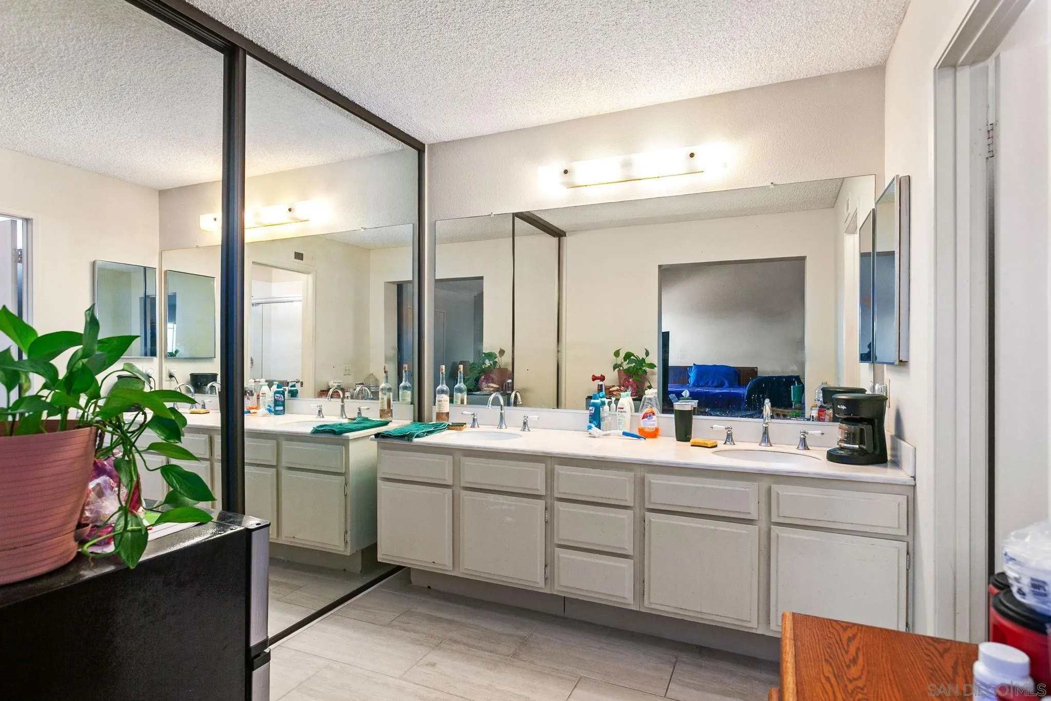 4468 Inverness Drive Oceanside, CA 92057 - Photo 16 of 29 a room with sink and mirror