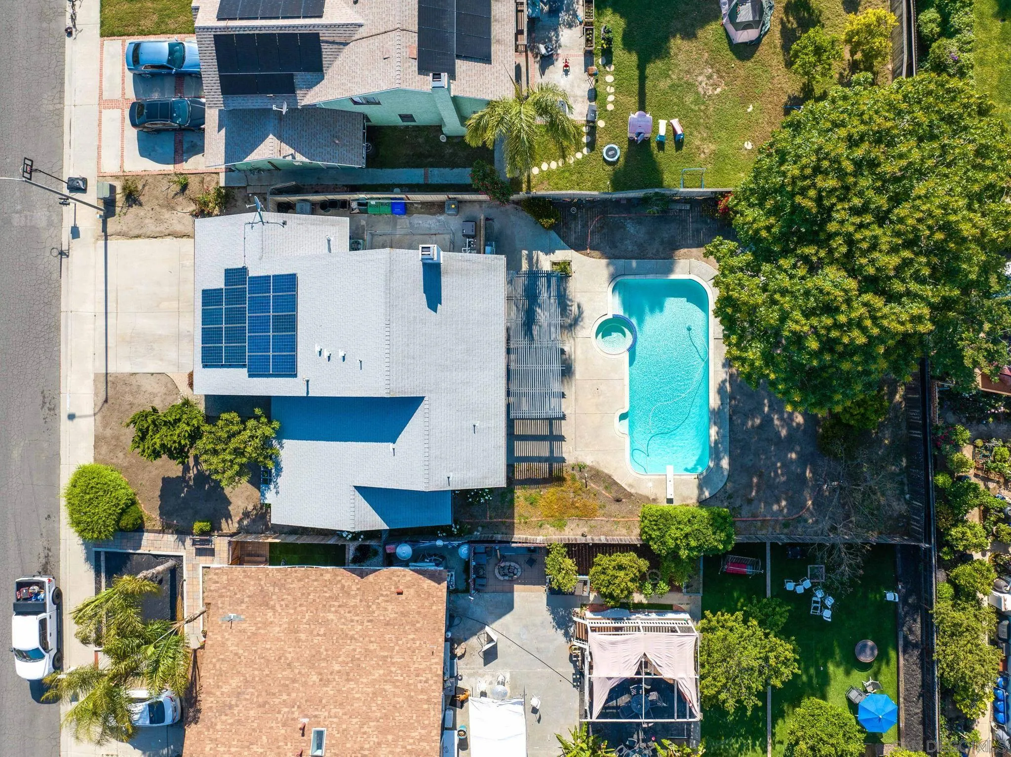 4468 Inverness Drive Oceanside, CA 92057 - Photo 22 of 29 an aerial view of a house with a yard and a fountain