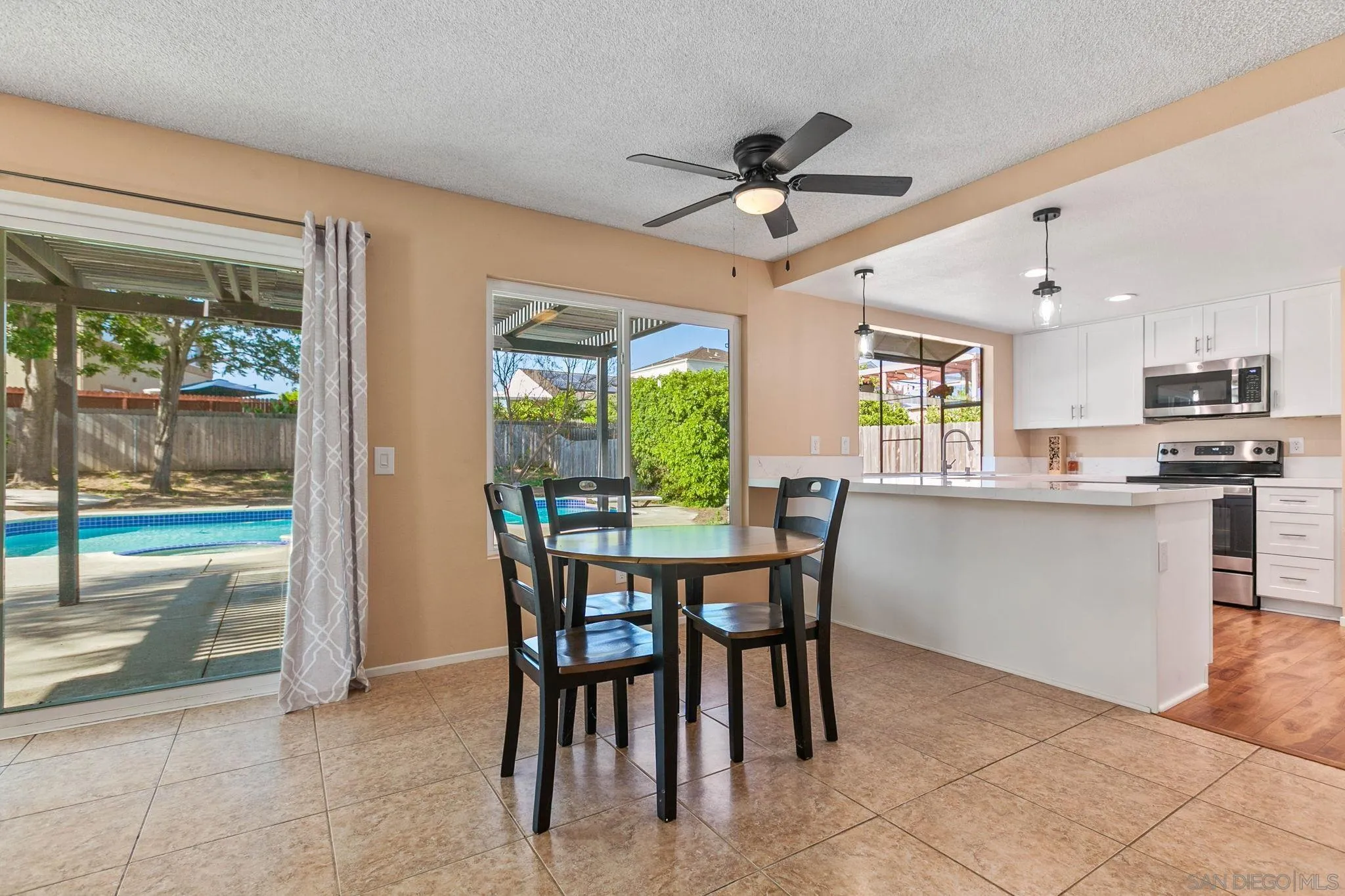 4468 Inverness Drive Oceanside, CA 92057 - Photo 8 of 29 a view of a dining room with furniture window and outside view
