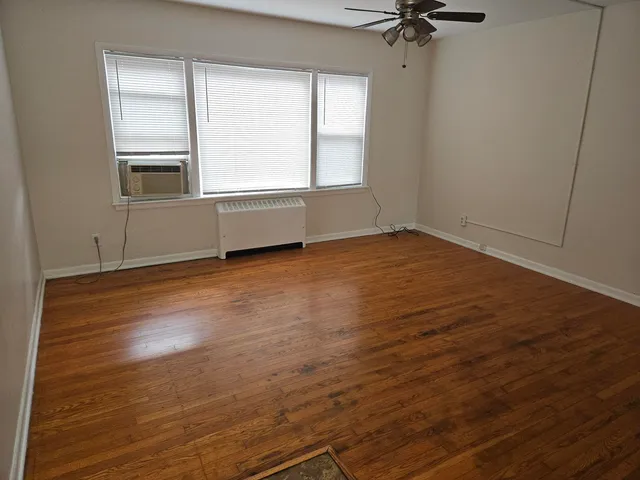 a bathroom with a sink mirror toilet and bathtub