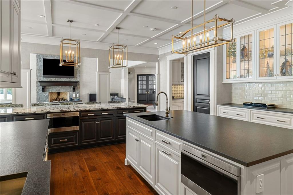 435 Myoma Road Mars, PA 16046 - Photo 8 of 50 Showpiece chef's kitchen with an oversized waterfall island, custom cabinetry and premium stainless-steel appliances.