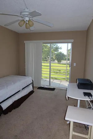 a bedroom with a bed and a walk in closet