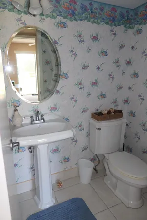 storage and utility room with two washing machine