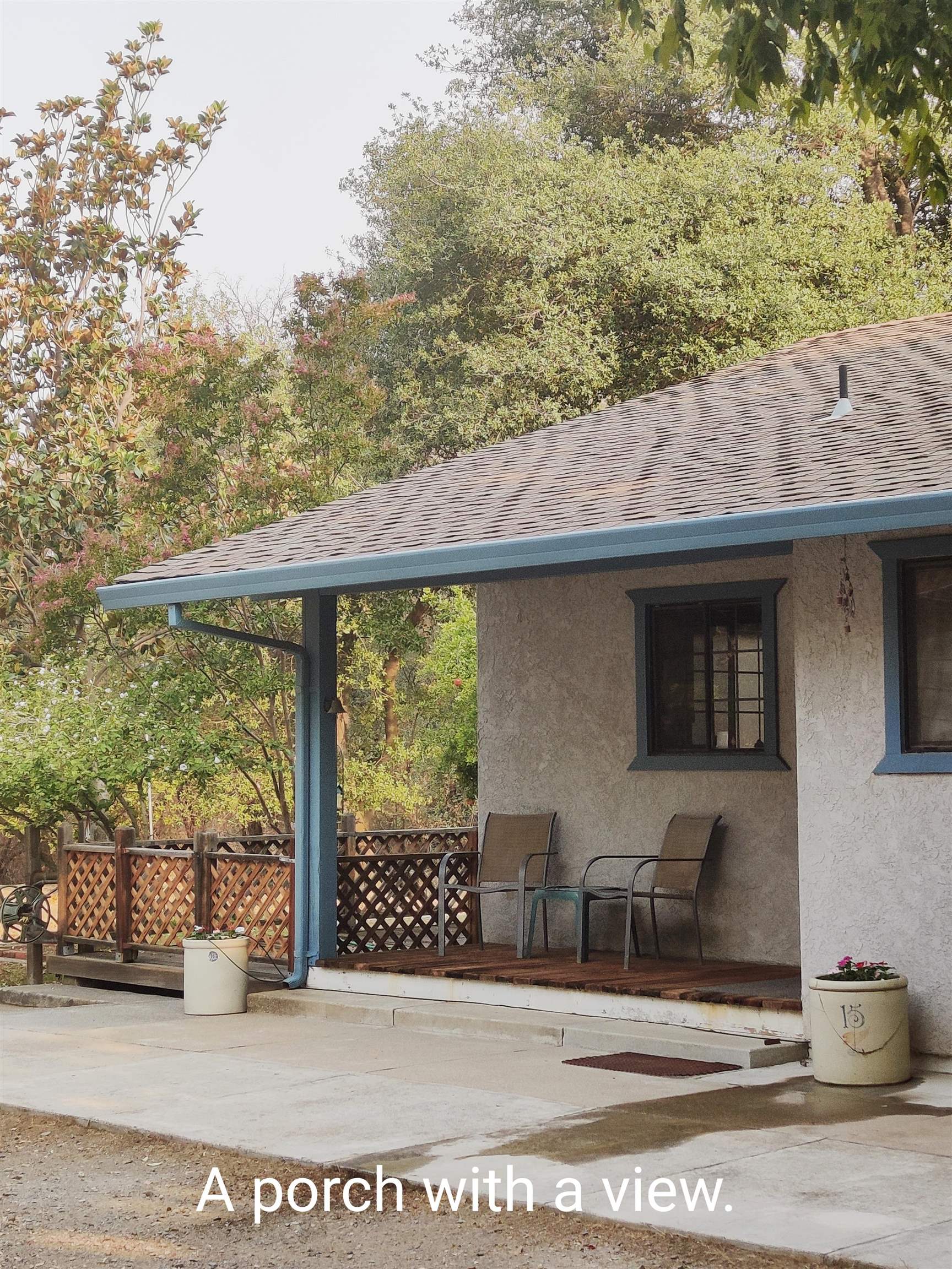 12455 Wilder Road Red Bluff, CA 96080 - Photo 7 of 73 a view of a house with a floor to ceiling window and outdoor space