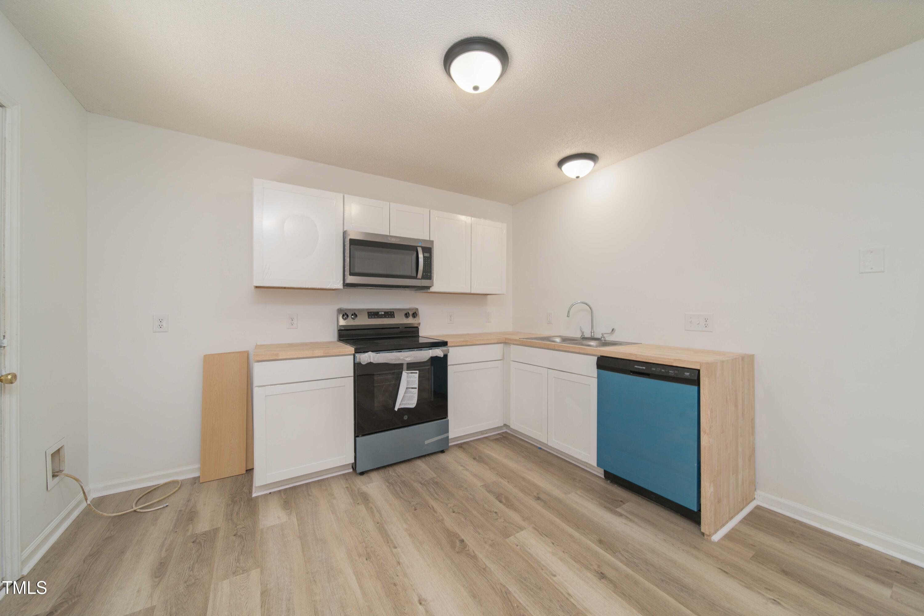 4258 Kaplan Drive Raleigh, NC 27606 - Photo 7 of 20 KFK00013-Edit