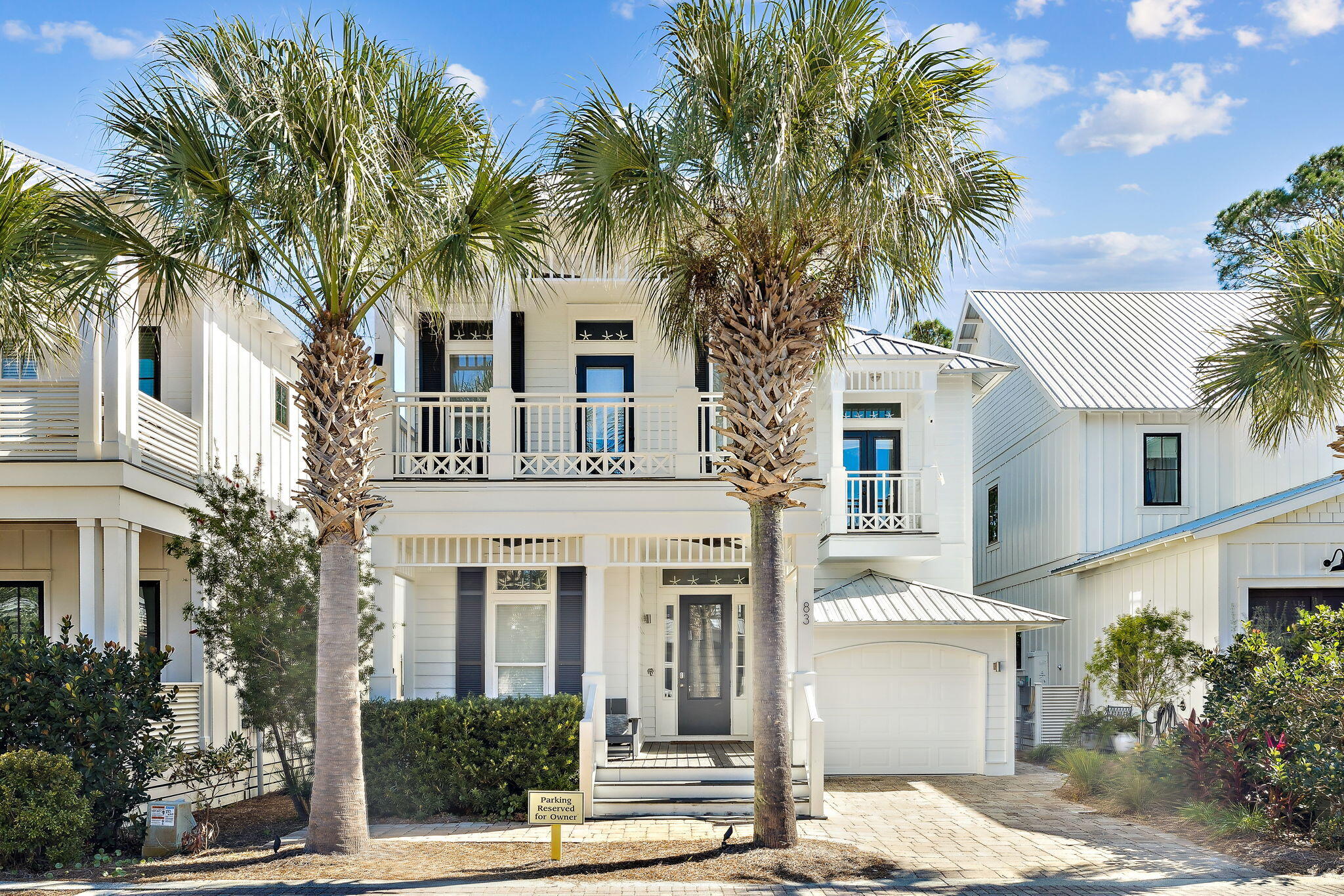 83 Eastern Lake Court Santa Rosa Beach, FL 32459 - Photo 1 of 40 a front view of a house with a garden