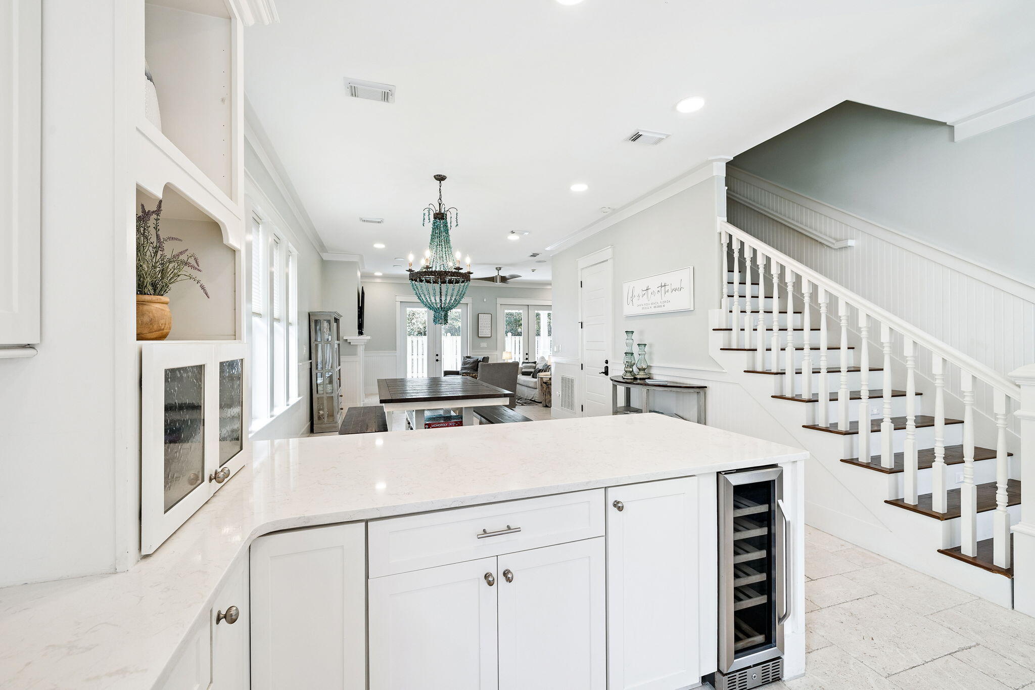 83 Eastern Lake Court Santa Rosa Beach, FL 32459 - Photo 13 of 40 a kitchen with cabinets a sink and white appliances