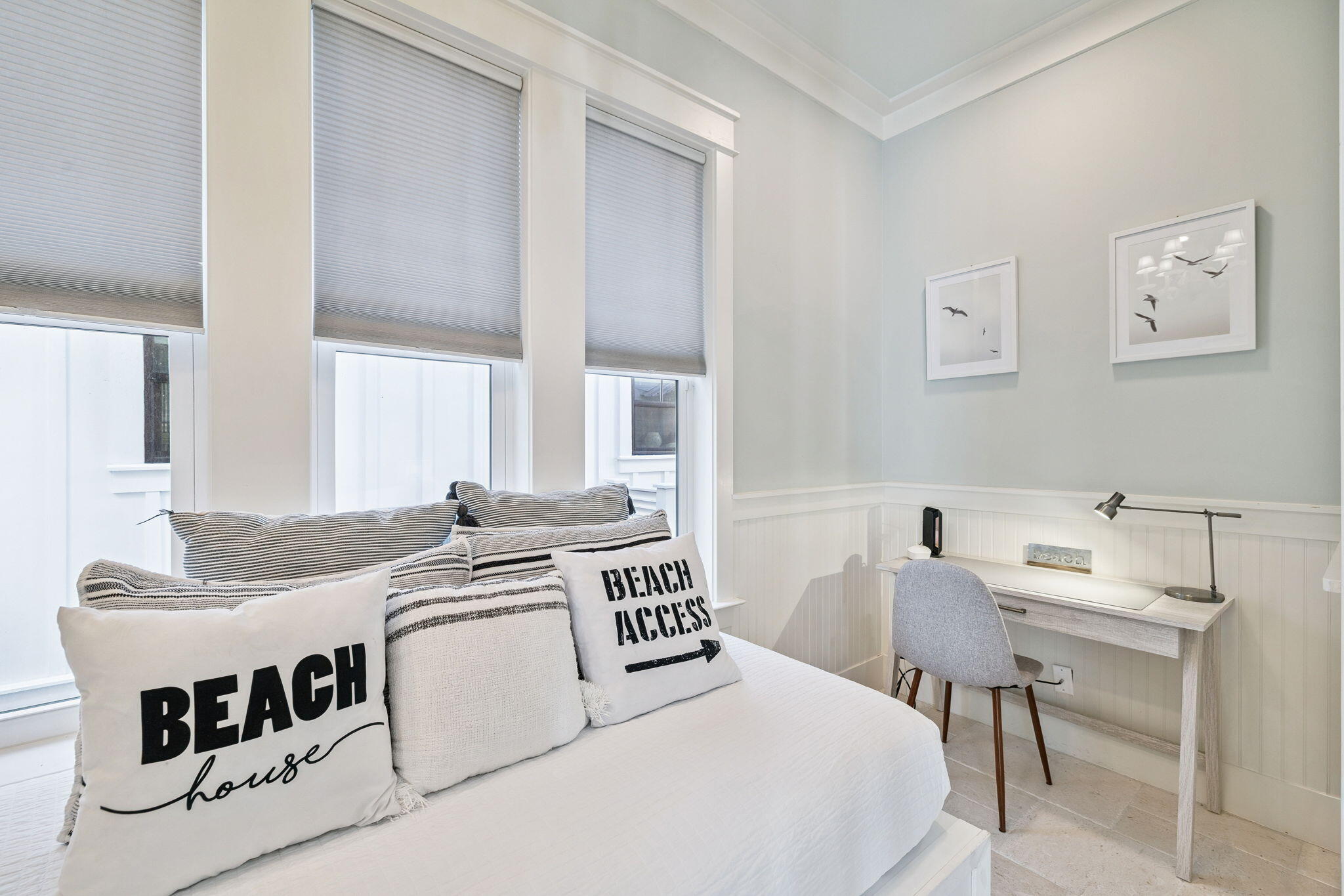 83 Eastern Lake Court Santa Rosa Beach, FL 32459 - Photo 20 of 40 a bedroom with a bed and a table in it