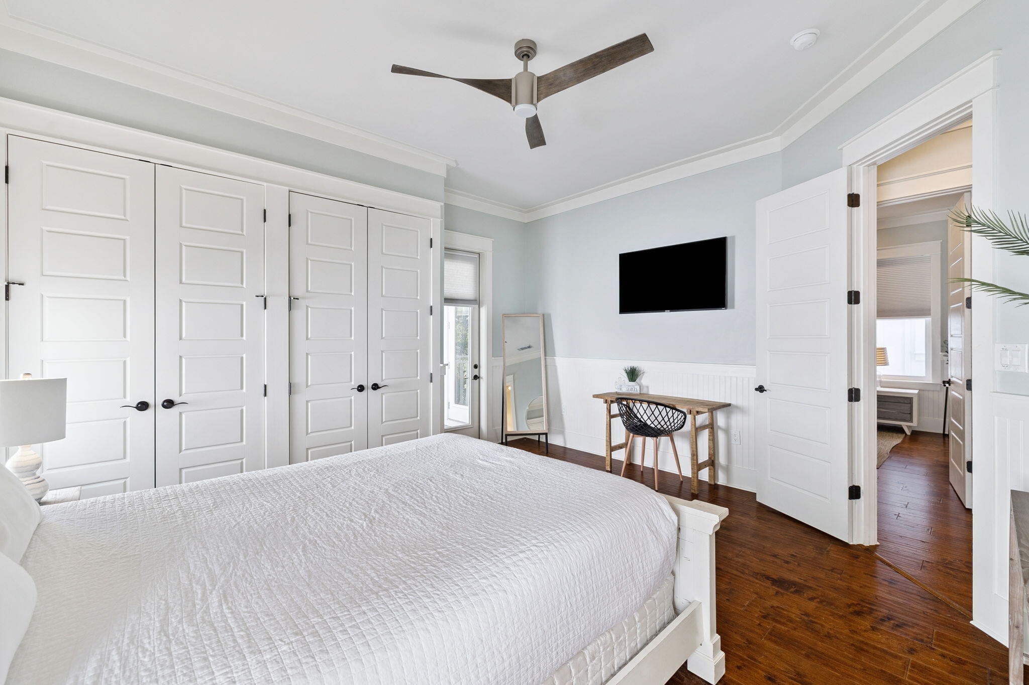 83 Eastern Lake Court Santa Rosa Beach, FL 32459 - Photo 30 of 40 a spacious bedroom with a bed and a flat screen tv