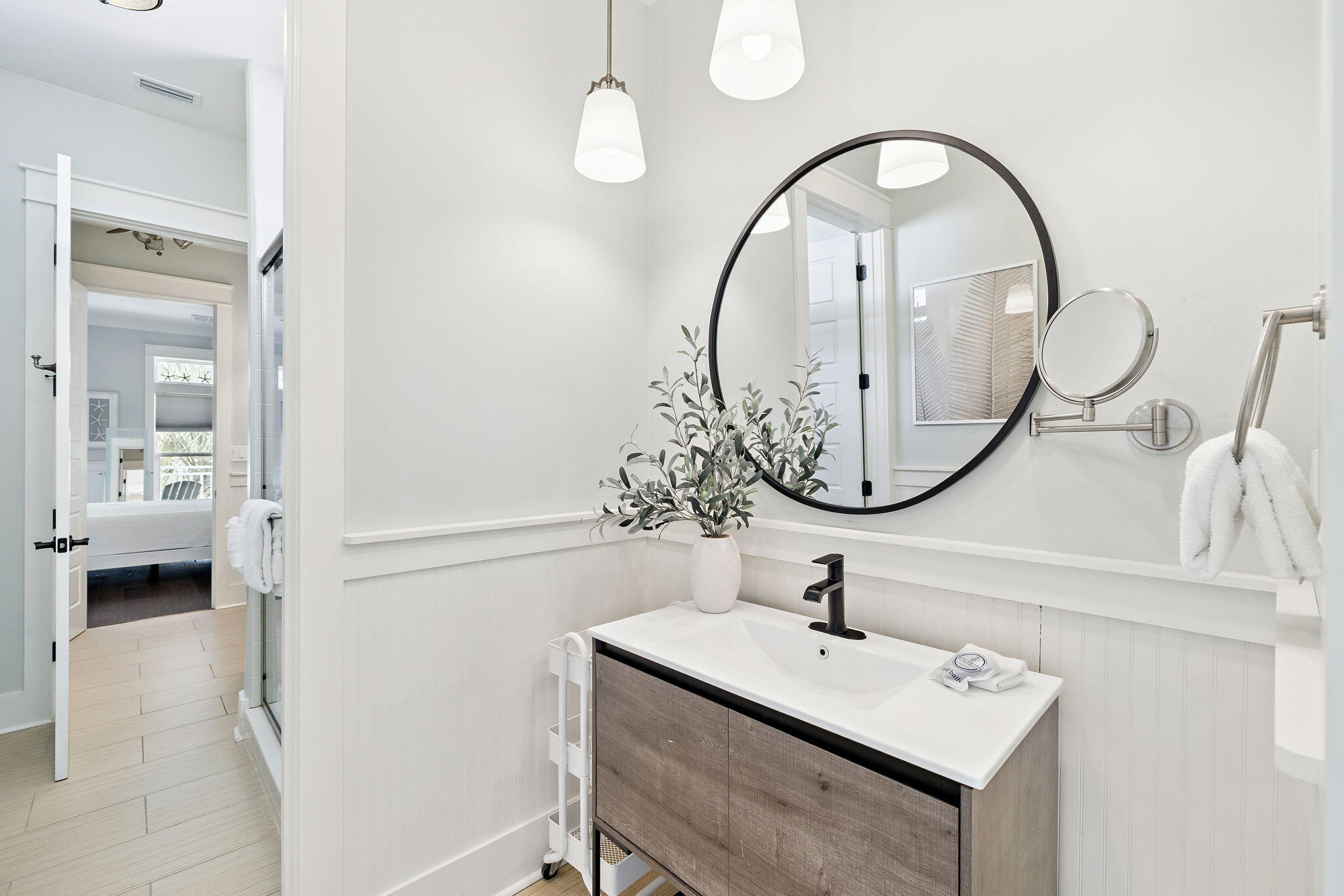 83 Eastern Lake Court Santa Rosa Beach, FL 32459 - Photo 32 of 40 a bathroom with a sink and a mirror