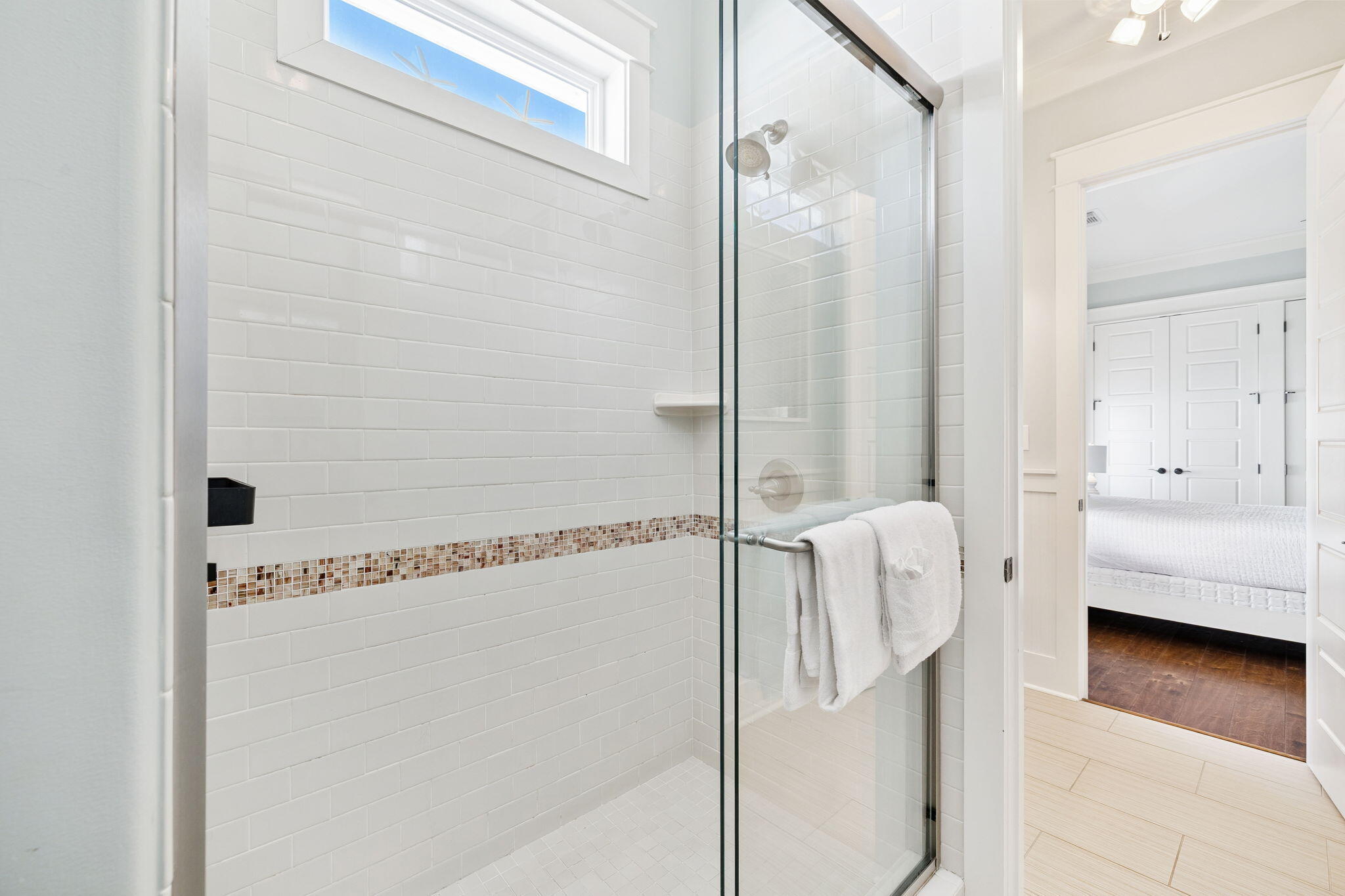 83 Eastern Lake Court Santa Rosa Beach, FL 32459 - Photo 33 of 40 a bathroom with a shower and a mirror