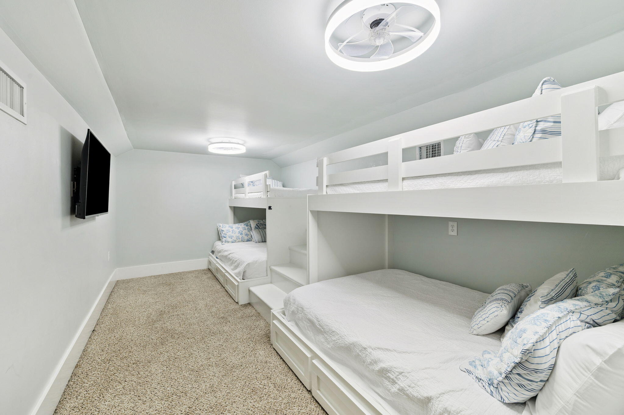 83 Eastern Lake Court Santa Rosa Beach, FL 32459 - Photo 38 of 40 a bedroom with a large bed and a flat tv screen