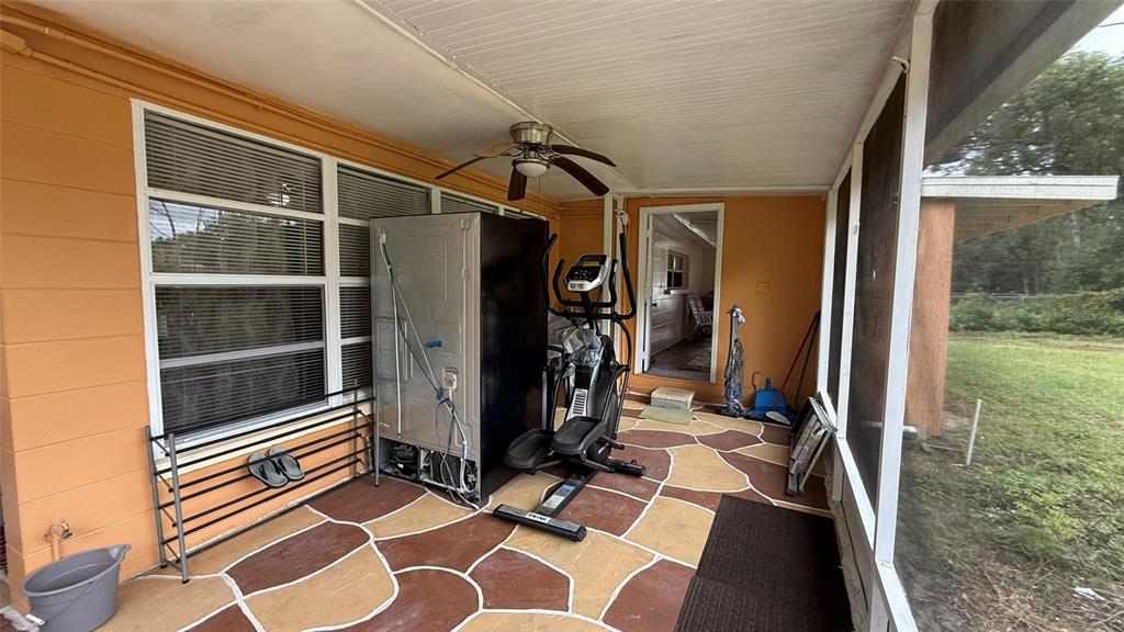 5754 9th Street Zephyrhills, FL 33542 - Photo 16 of 25 a view of a room with gym equipment