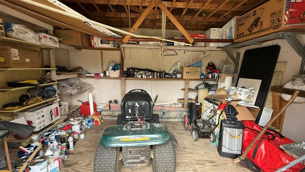 5754 9th Street Zephyrhills, FL 33542 - Photo 25 of 25 a storage room with furniture